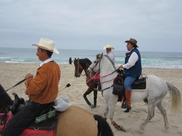 A caballo en la playa